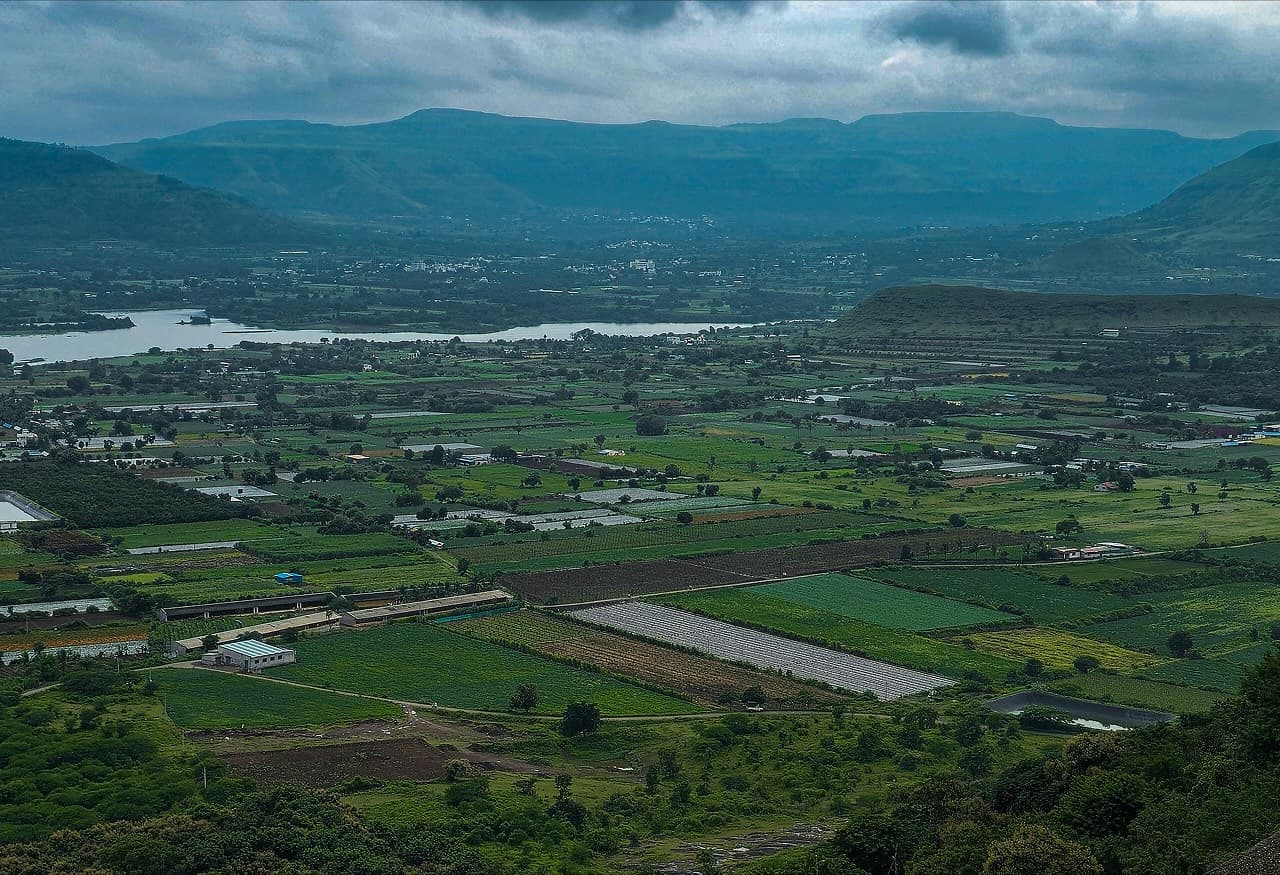 Wide landscape view of land investment corridors